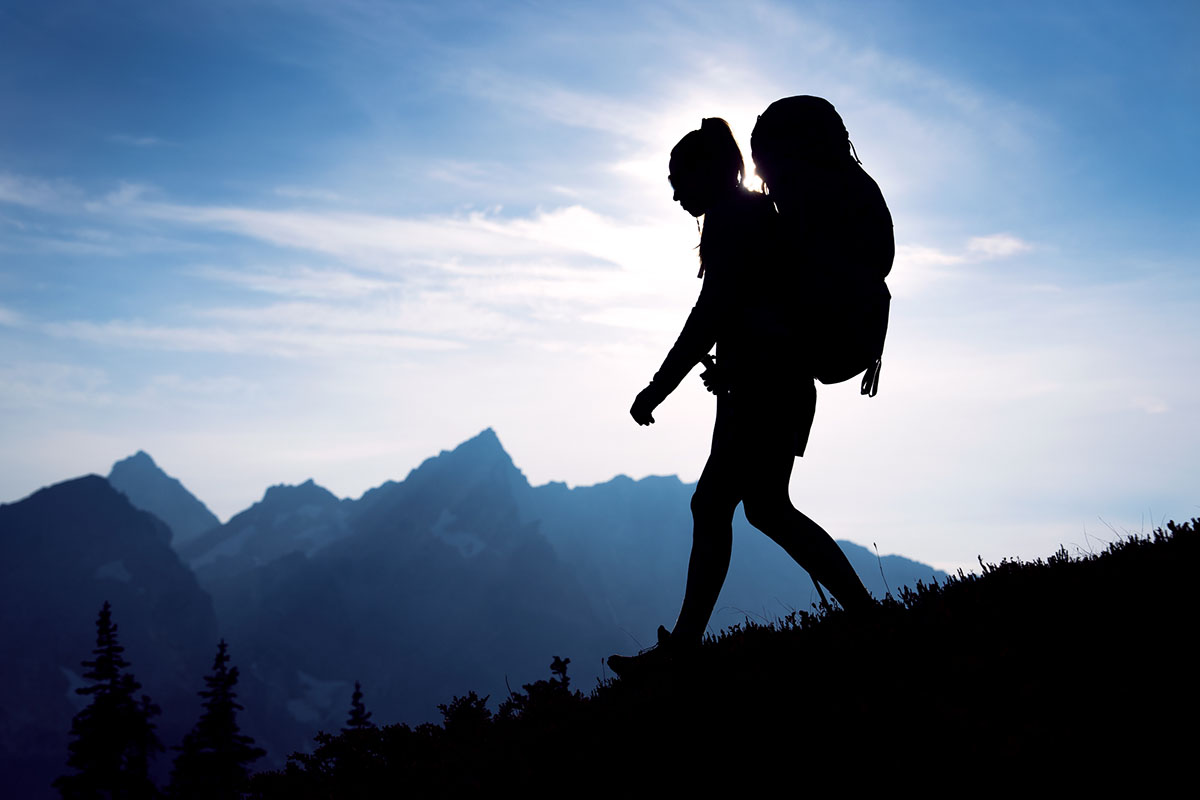 Deuter Aircontact Core 60 10SL backpacking pack silhouette in mountains تصویر Deuter Aircontact Core 60 10SL backpacking pack silhouette in mountains